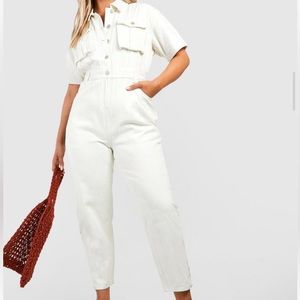 Brand new, just wrinkled. Cream/off-white jump suit